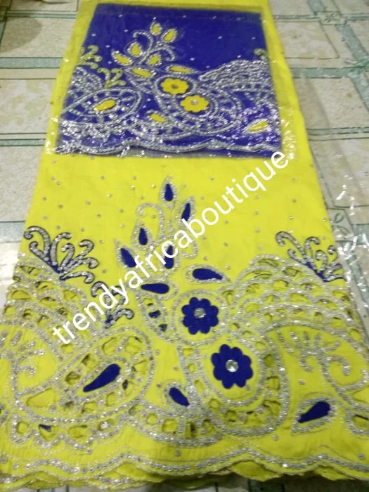 Sale: original quality Taffeta Silk George wrapper: quality yellow George/royal blue contrast  blouse. Embellished with crystal stones for Nigerian traditional wedding/party outfit. Come as 2.5yds+2.5yds +1.8yds matching net. Aso-ebi order available Best party dresses for dancing