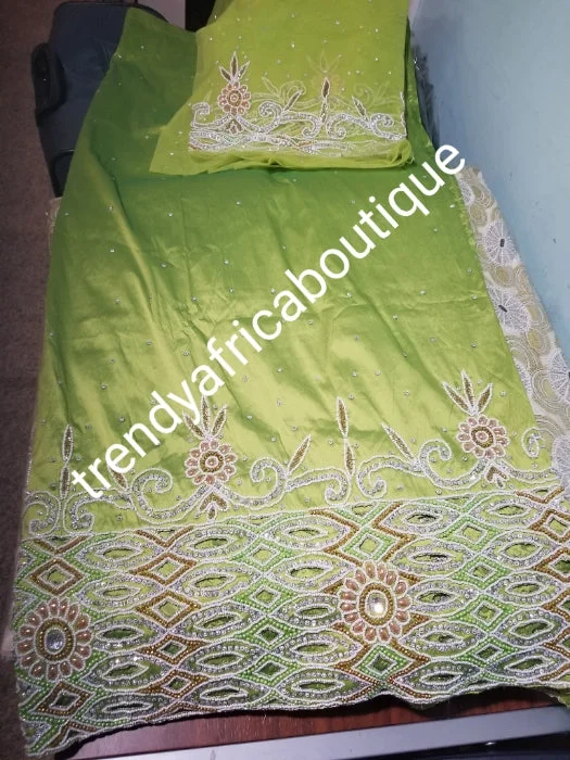 Sale: Quality Lemon Green Taffeta Silk George wrapper: hand cut border beaded and silver crystal stoned for Nigerian traditional wedding/party outfit. Come as 2.5yds+2.5yds +1.8yds matching net for blouse. best Indian-george. Best party dresses for plus size