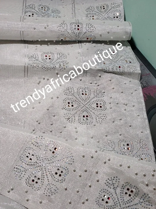 Classic silver Beaddazzled aso-oke for making Nigerian latest party Gele.  Embellished with Clear and colored crystal stones. woven quality aso-ebi 82" long x 20" wide Halter party dresses