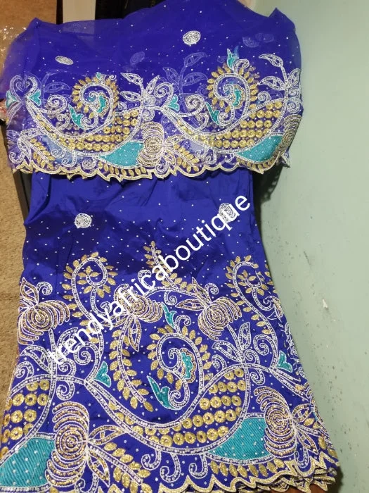 Quality Royal Blue  embriodered and stone silk George wrapper. Top quality Indian-George for making Nigerian/African party dress, wrapper and more. 5yds silk George + 1.8yds matching net blouse. Contact us if you are interested in Aso-ebi order Hot new arrivals in party dresses