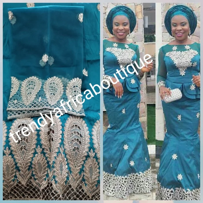 Teal green Embriodery Nigerian wedding George fabric and net blouse. Come 5yds +1.8yds wrapper. New arrival aso-ebi Silk George. Sold as a set. Small-George for Nigerian party dress Street style party dresses